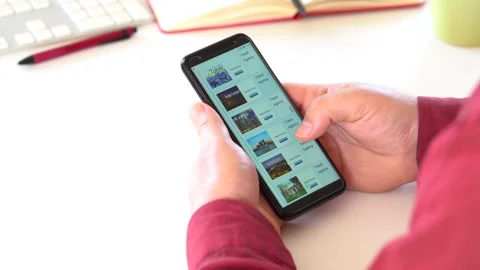 A Man makes a reservation while surfing the internet. Marrakech City Vidéo 145709084