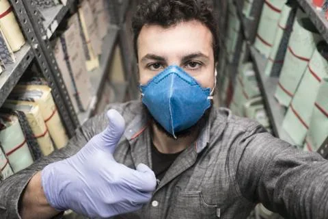 Man makes a self-portrait inside an old document file Foto stock