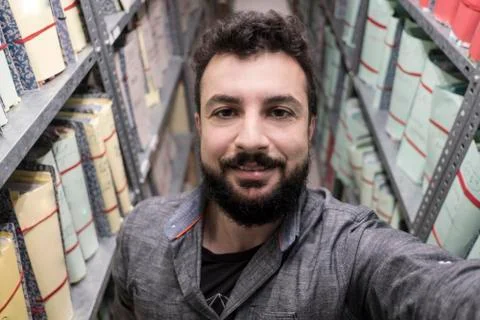 Man makes a self-portrait inside an old document file Stock Photos