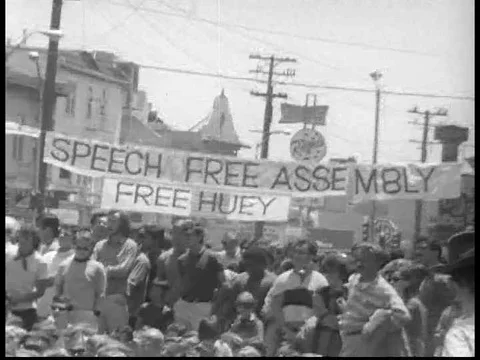 A man makes a speech about fighting the cops at a protest in 1968 Berkeley. Stock Footage 75278452