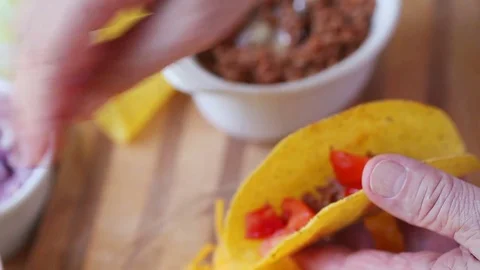 Man makes tacos closeup Video stock 76745782