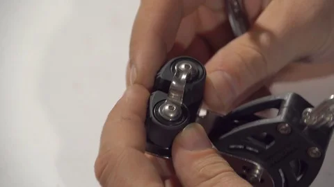 A man makes yacht blocks. Factory for the production of equipment for sailing ya Stock Footage 80240953