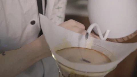 Man making alternative specialty filter coffee in pour over, brewing, minimal Video stock 221261777