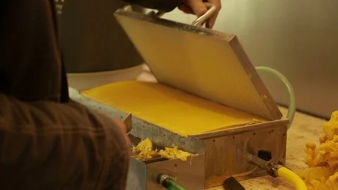Man making artificial honeycombs Stock Footage 74056774