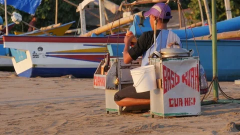 Man making Bakso soup on beach in Pangandaran Java Indonesia Stock Footage 82080494