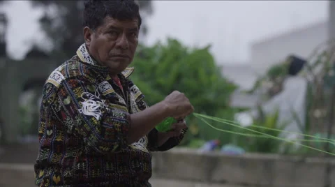 Man making ball of wool, Guatemala Stock Footage 63055754
