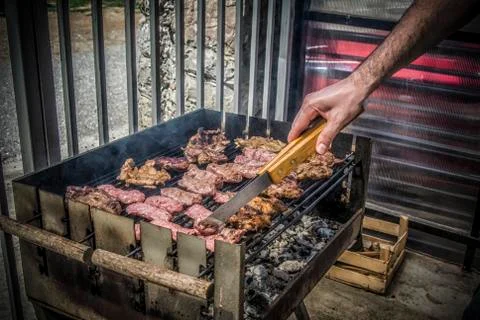 A Man Making Barbecue Stock Photos