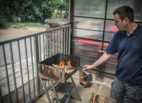 A Man Making Barbecue Stock Photos
