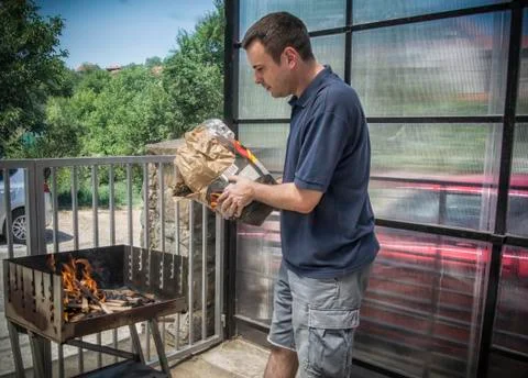 A Man Making Barbecue Stock Photos