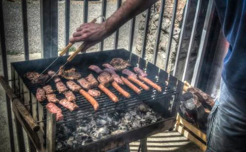 A Man Making Barbecue Stock Photos
