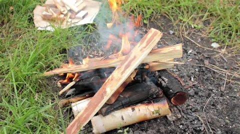 Man making a bonfire with firewoods 動画素材 24812682