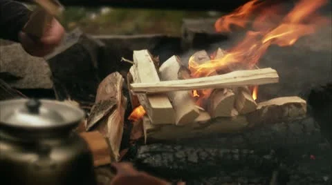 A man making a camp fire Stock Footage 11315459