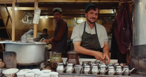 Man making chai tea in Quetta Pakistan Stock Footage 232601779