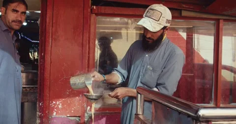 Man making chai tea in Quetta Pakistan Stock Footage 232601902
