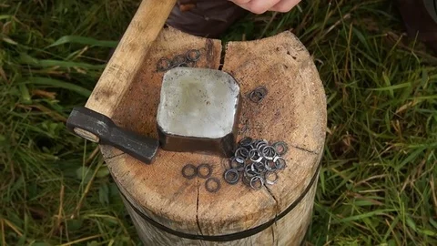 Man making chain armor, blacksmith Stock Footage 78528539