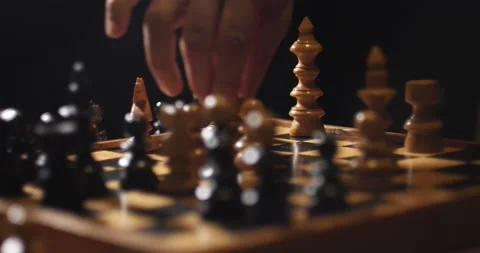 Man thinking about next chess move gets checkmate - Free Stock Video