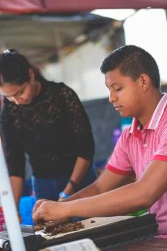 Man making cigars. Stock Photos