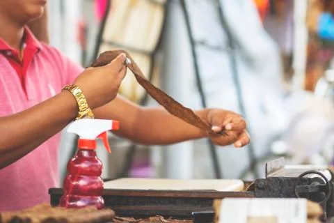 Man making cigars. Stock Photos