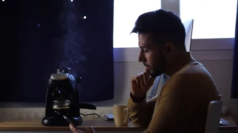 Man making coffee at home Stock Footage 128896434