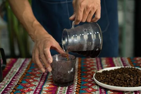A man is making coffee Stock Photos