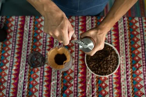 A man is making coffee Stock Photos