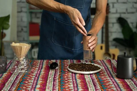 A man is making coffee Stock Photos