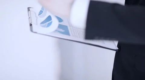 Man making corrections in document Stock Footage 61479961