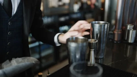 A man is making a drink at a bar Stock Footage 295993884