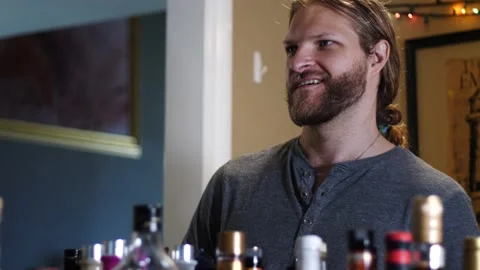 Man making drinks behind bar Stock Footage 154761910