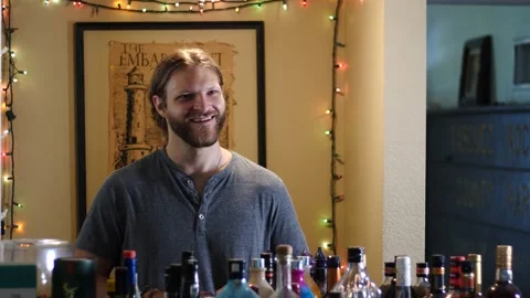 Man making drinks behind bar Stock Footage 154761964
