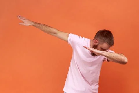 Man making dubdance move, celebrating victory, triumph, showing popular internet Foto stock