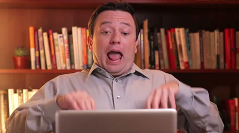 A man making faces video chatting on a computer Stockbeeldmateriaal 33841954