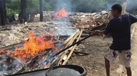 Man making the famous Adobe Pan "Panela de Barro" Stock Footage 51870699