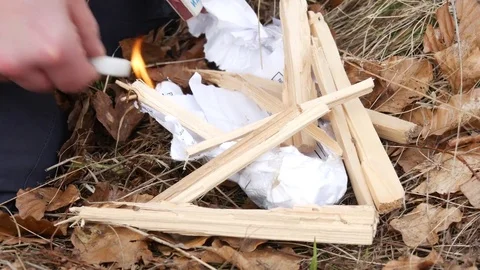 Man making a fire. Stock Footage 74226199
