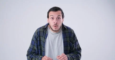 Man making funny binoculars hands gesture 库存影片 143942898