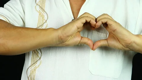 Man is making hand heart, in studio  Chiangmai  Thailand. Stock Footage 167573793
