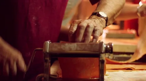 Man making homemade pasta with a roller Stock Footage 59127094