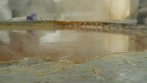 Man making Jaggery in food process in the plant Stock Footage 221889232