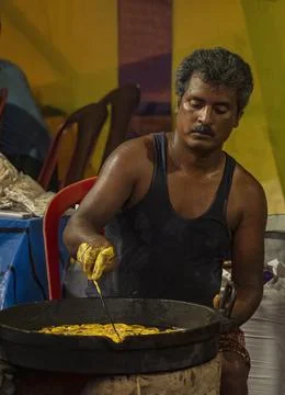 A man making jalebi. Stock Photos