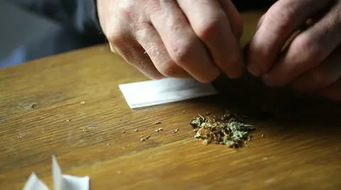 Man making a joint, sequence Stock-Footage 21835456