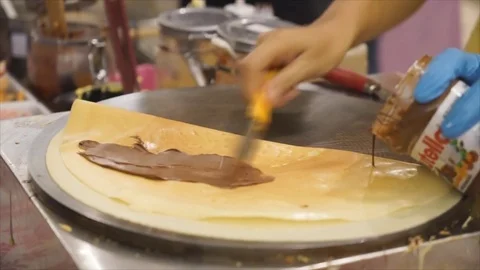 Man making local pancake crape Japanese style Stock-Footage 77293356