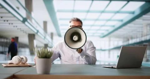 Man Making Megaphone Announcement Stock Photos