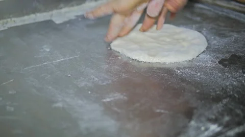 Man Making Middle Eastern Flat Bread Stock Footage 40975361