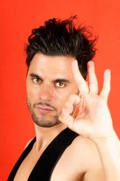 Man making ok gesture Stock Photos