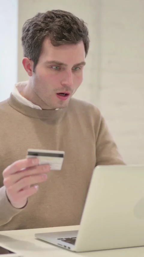 Man making Online Payment Failure on Laptop in Office, Vertical Video Stock Footage 337351371