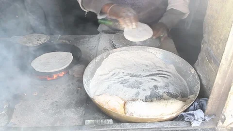 Man making paratha Stock Footage 95690296