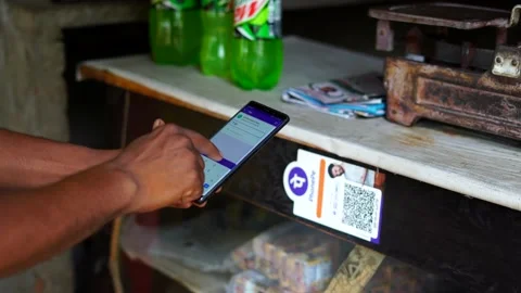 Man making payment using PhonePe upi at tea shop Stock Footage 220692475