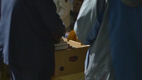 Man making payment while purchasing books at the book stall Stock Footage 73699386
