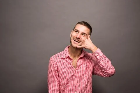 Man making phone gesture Stock Photos