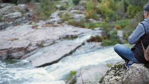 Man making pictures with a camera while traveling. Stock Footage 95199628